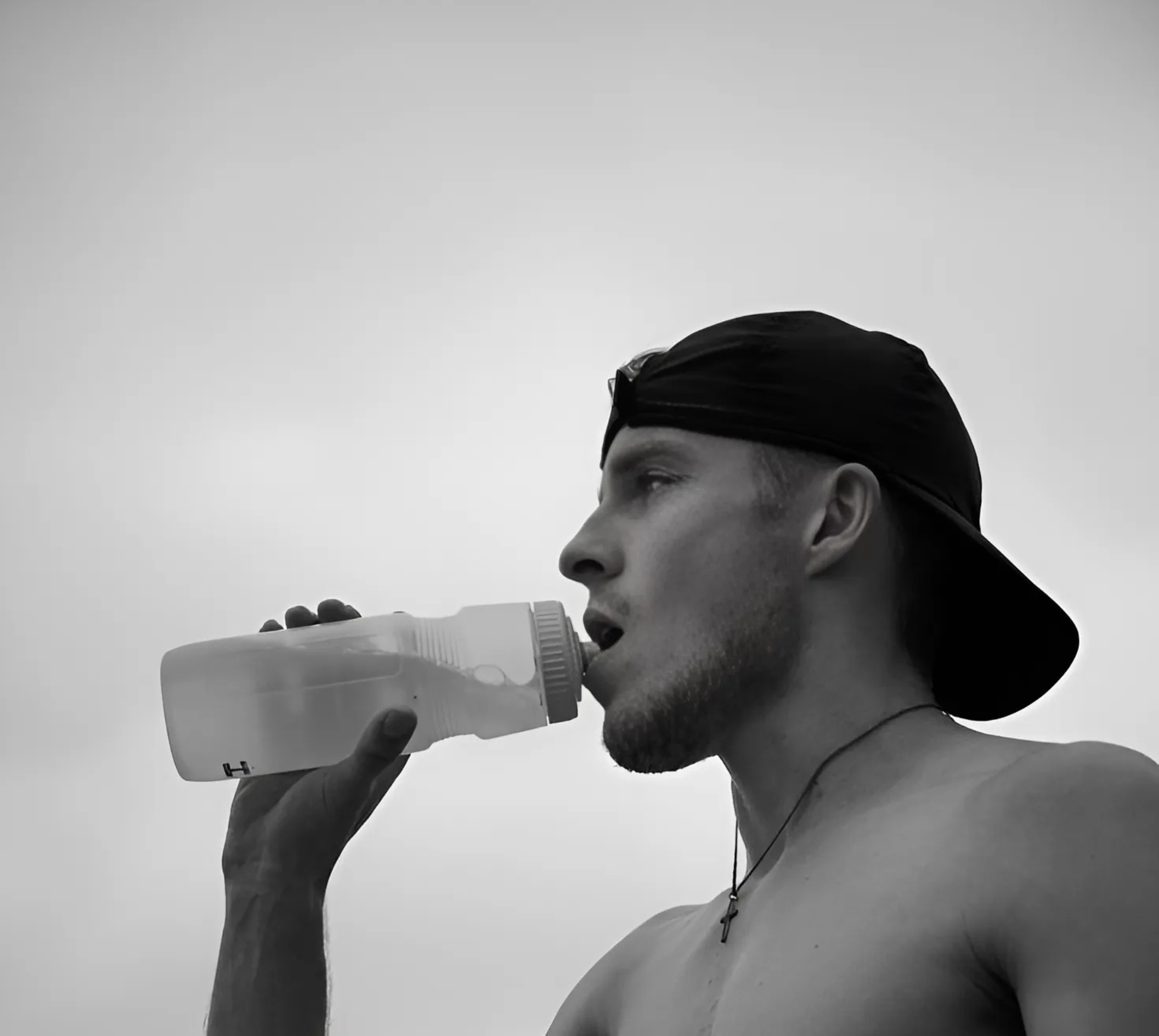 Man drinking from a water bottle