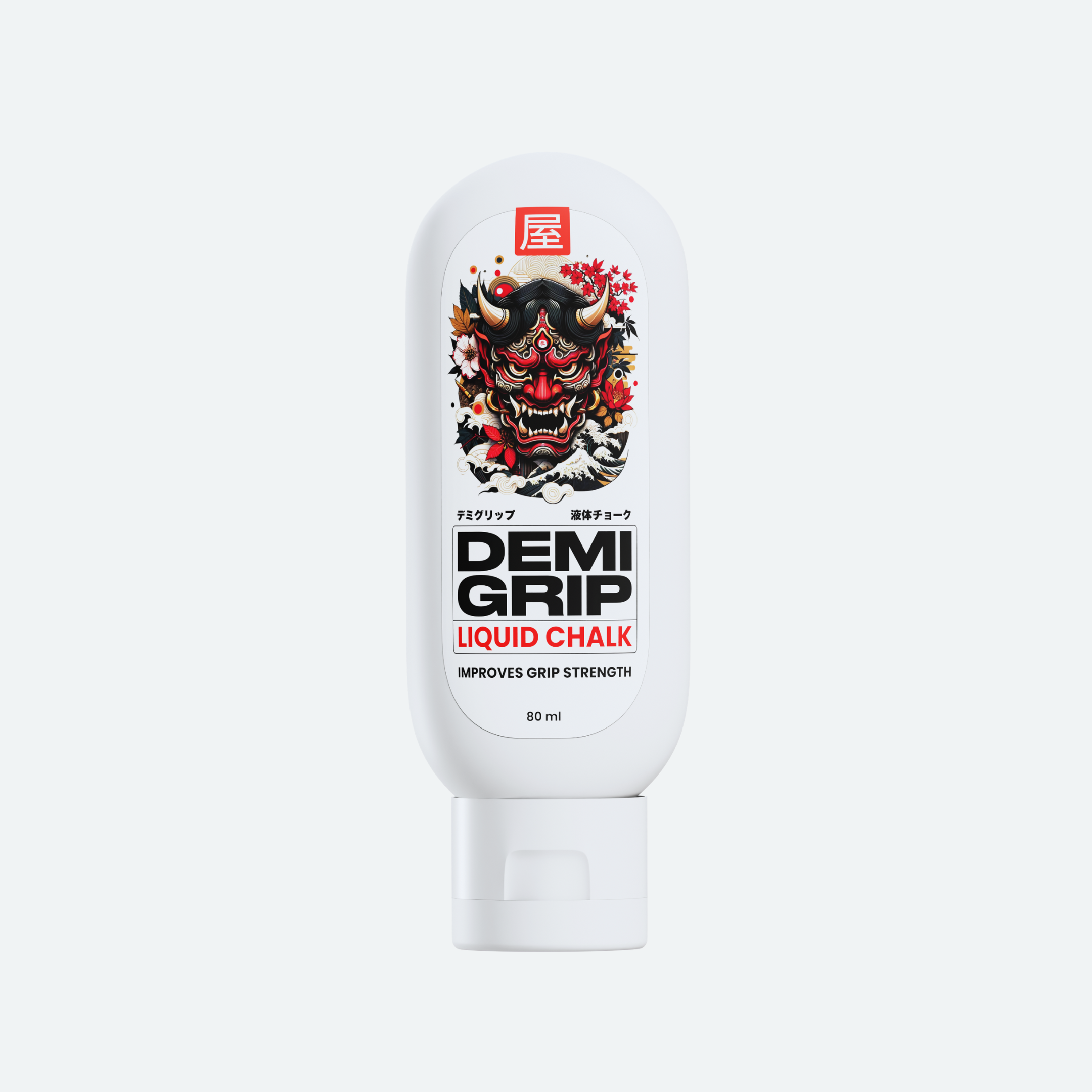 A white bottle of Demi Grip Liquid Chalk, featuring a bold and striking label with a traditional Japanese Oni (demon) mask design. The product name 'DEMI GRIP' is prominently displayed in black text, with 'LIQUID CHALK' written below in red. The label also includes the phrase 'IMPROVES GRIP STRENGTH' and indicates a 60 ml capacity. The overall design combines modern typography with cultural imagery for a unique and eye-catching appearance.