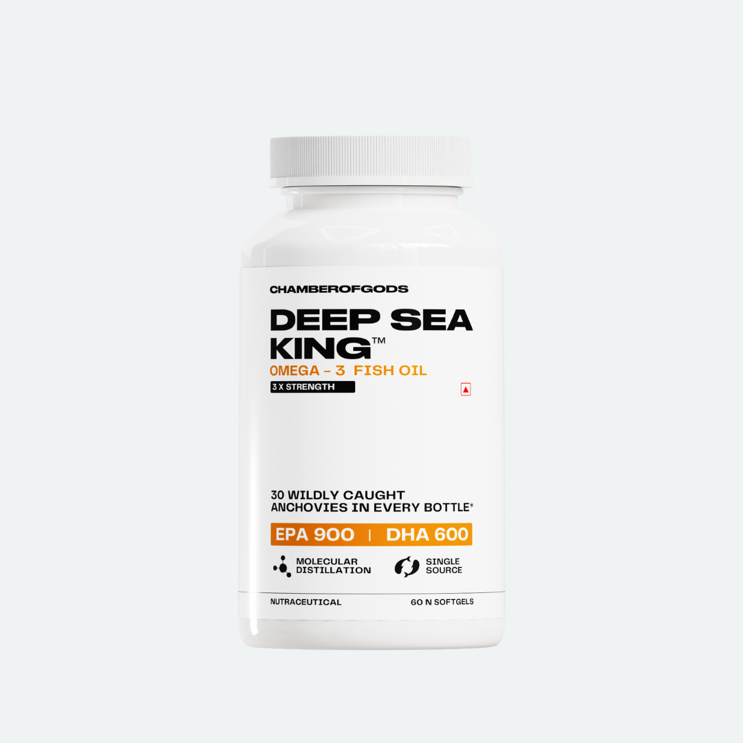 Deep Sea King Omega-3 Fish Oil Bottle: A high-strength supplement featuring 3X potency with EPA 900 mg and DHA 600 mg per serving. Contains 38 wild-caught anchovies per bottle, ensuring purity and quality. Manufactured using molecular distillation for optimal purity and single-source ingredients. Packaged in a white bottle with a black cap, labeled with 'Deep Sea King' and key nutritional details.